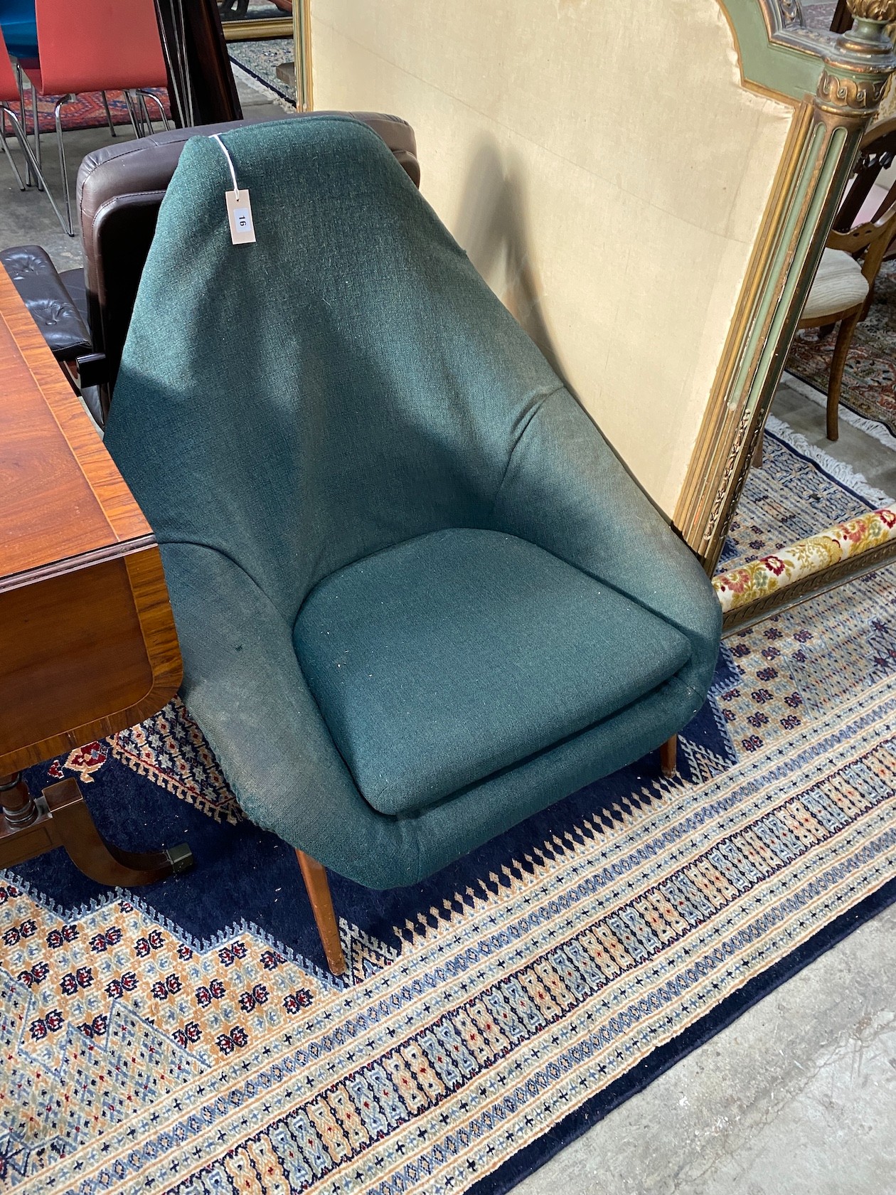 A Lurashell glass fibre lounge chair, diameter 88cm, depth 90cm, height 92cm